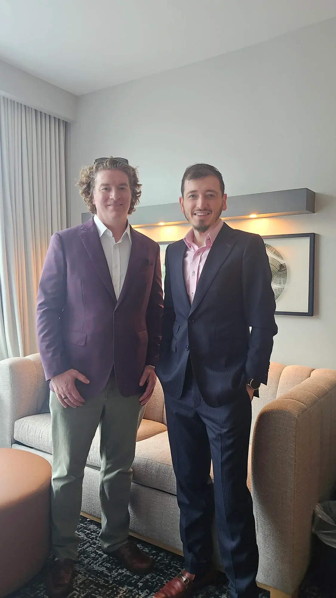 Tailor and client together at a private appointment